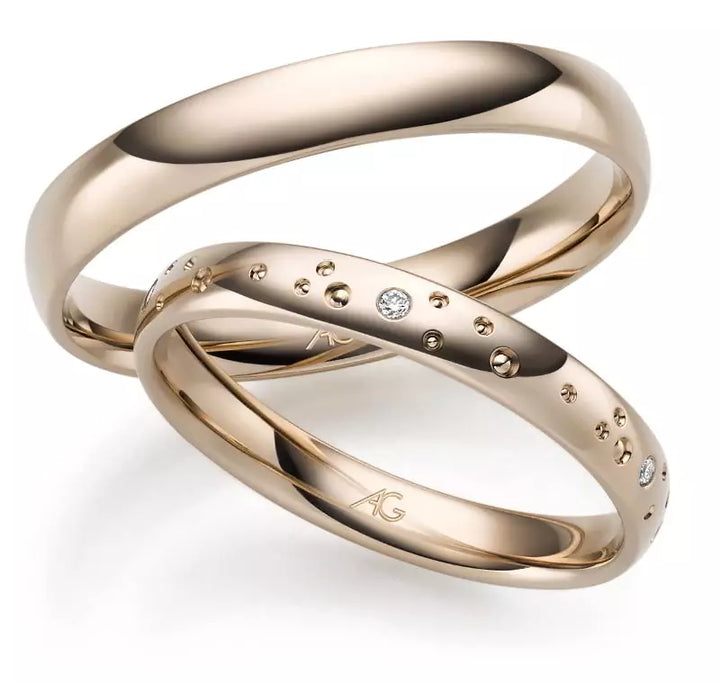 Eheringe Sternenstaub mit leicht gewölbter Oberfläche und 5 Brillanten