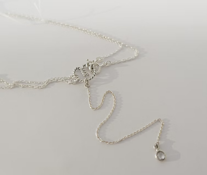 „Loop twist“ Verschluss